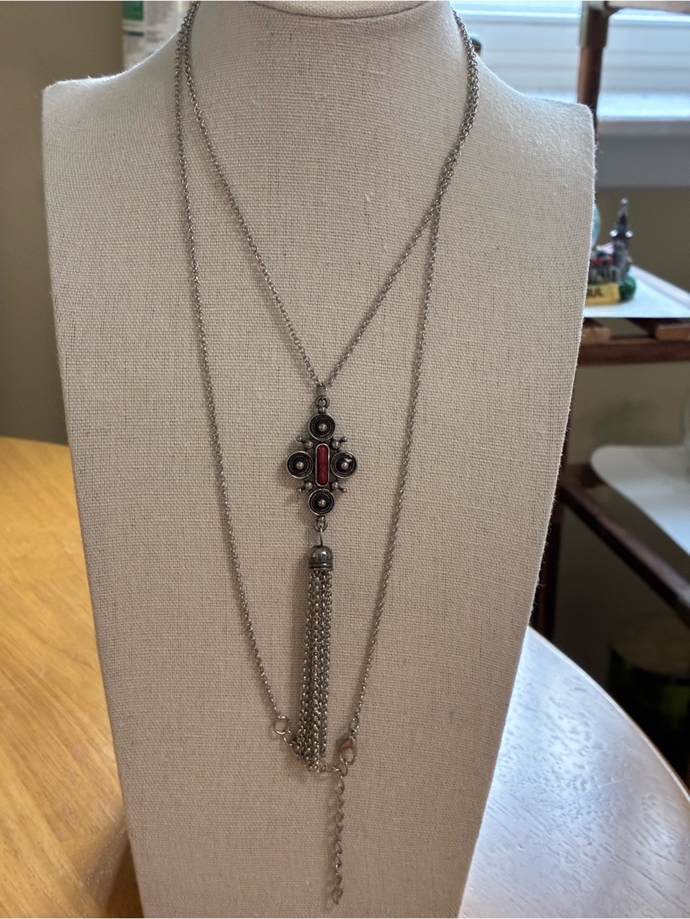 Silver-Tone Layered Tassel Necklace with Red Accent Pendant